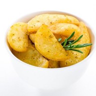 Картофельные дольки по-средиземноморски Фото