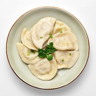 Вареники с капустой отварные Фото