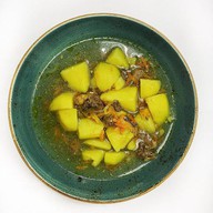 Картофель тушеный с мясом Фото