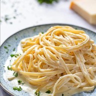 Спагетти под соусом Фото