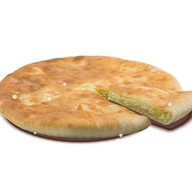 Осетинский пирог с сыром сулугуни Фото