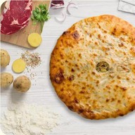 Осетинский пирог с мясом и картошкой Фото