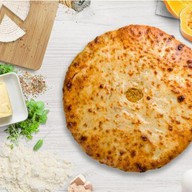 Осетинский пирог с сыром и тыквой Фото
