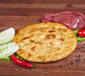 Осетинский пирог с мясом и капустой - Фото