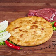 Осетинский пирог с мясом и капустой Фото
