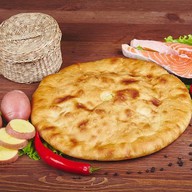 Осетинский пирог с сёмгой и картошкой Фото