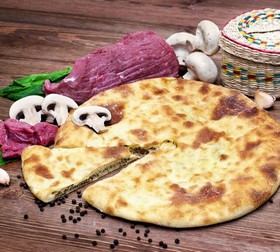 Осетинский пирог с мясом и грибами - Фото