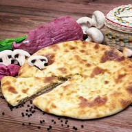 Осетинский пирог с мясом и грибами Фото