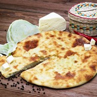 Осетинский пирог с капустой и сыром Фото