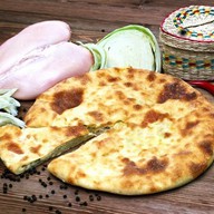 Осетинский пирог с курицей и капустой Фото