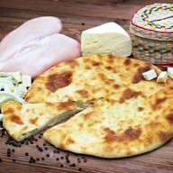 Осетинский пирог с сыром и курицей Фото