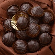Конфеты шоколадные Чернослив в шоколаде Фото