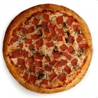 Пицца с ветчиной и грибами Фото