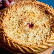 Осетинский пирог с вишней и яблоком Фото