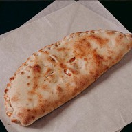 Кальцоне с грибами и сыром Фото