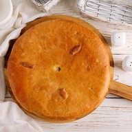Пирог осетинский с судаком,сыром,грибами Фото