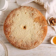 Пирог осетинский с финиками, инжиром Фото