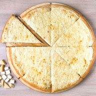 Четыре сыра пицца Фото