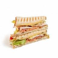 Сендвич с сыром и ветчиной Фото