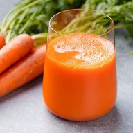 Морковный сок Фото
