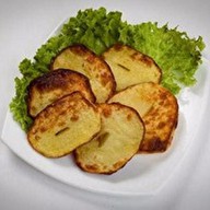 Печеный картофель на углях Фото