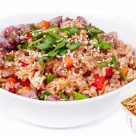 Рис со свининой и овощами Фото