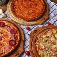 3 пиццы Фото
