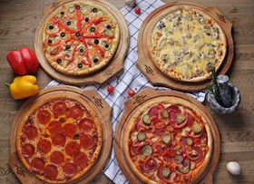 4 пиццы - Фото