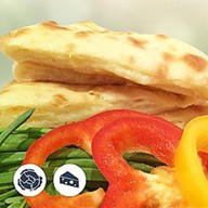 Осетинский пирог с капустой и сыр Фото