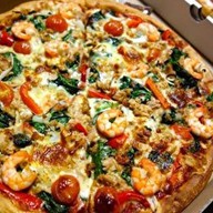Пицца с морепродуктами Фото