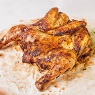 Цыпленок на мангале Фото