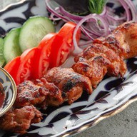 Шашлык из филе куриного бедра Фото