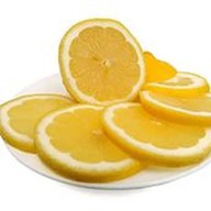 Лимон нарезкой Фото