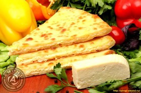 Осетинский пирог с зеленью и сыром - Фото