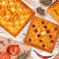 Аппетитный набор пирогов Фото