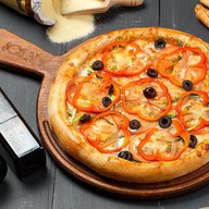 Пицца с овощами на гриле Фото