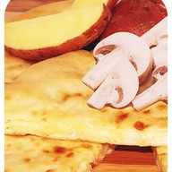 Осетинский пирог с грибами и картофелем Фото
