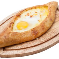 Хачапури по-аджарски с яйцом лодочка Фото