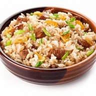 Рис с говядиной и овощами Фото