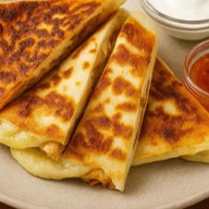 Кальцоне с курицей Фото