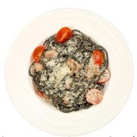 Спагетти allnero с морепродуктами Фото