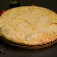 Кальцоне кон болоньезе Фото
