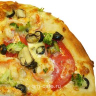 Пицца из морепродуктов Фото
