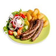 Тарелка с колбасками из говядины Фото