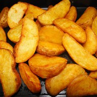 Картофель по-деревенски Фото