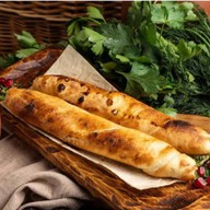 Хачапури на мангале с сыром сулугуни Фото