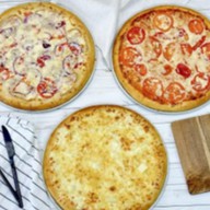 3 пиццы Фото